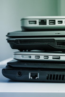 Laptops stacked together